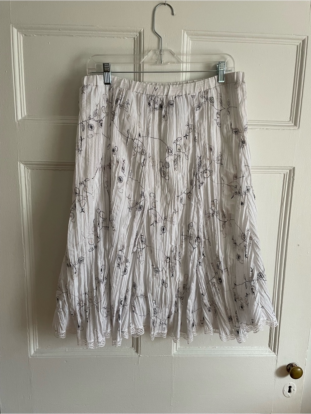 White Floral A-Line Pleated Skirt with Black Line Print
